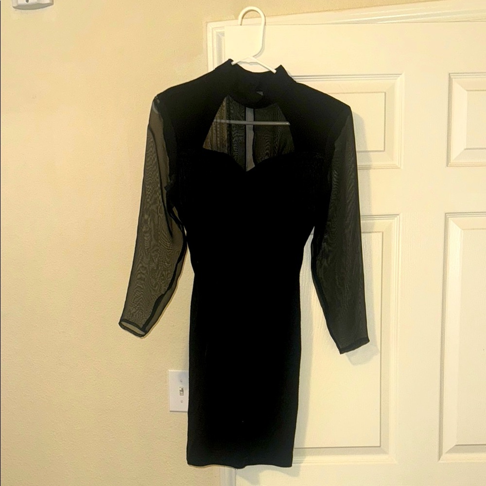 Size ⅞ vintage black mini dress
